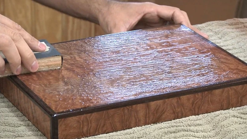 Glossy wooden surface after multiple lacquer coats